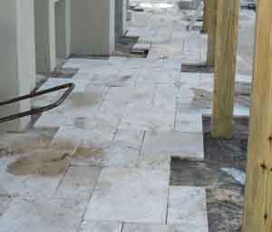 natural stone pavers being installed in Orlando Florida in a french pattern